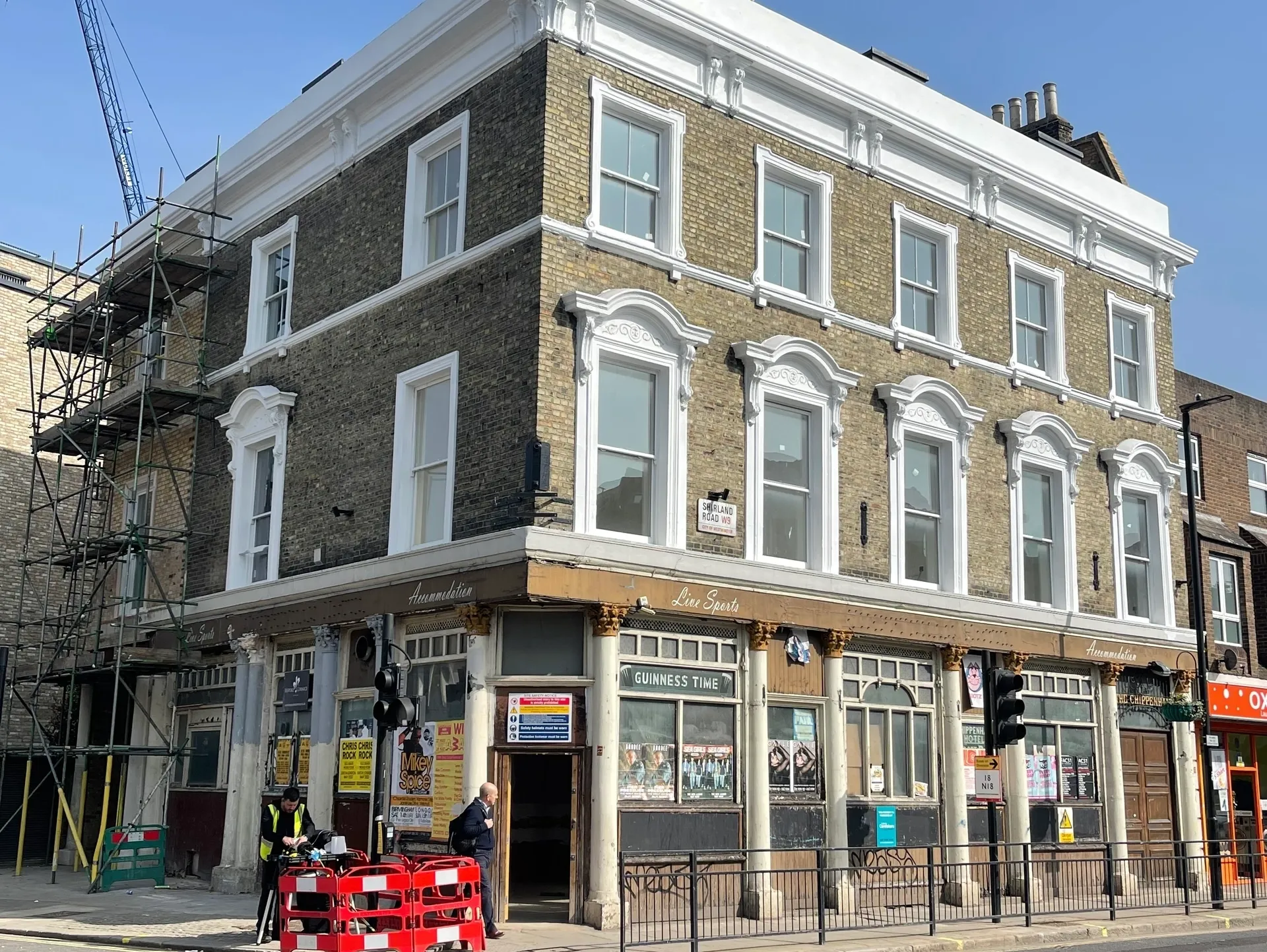 Victorian corner building — façade restoration, painted white, London